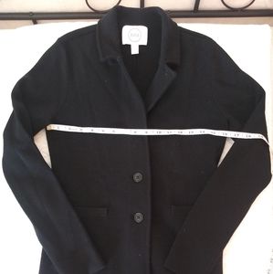 Merino wool and acrylic blazer.